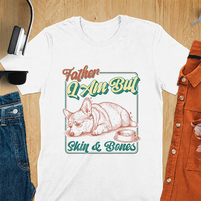 White tee with corgi retro vintage graphic, empty bowl illustration and "Father I Am But Skin & Bones" text