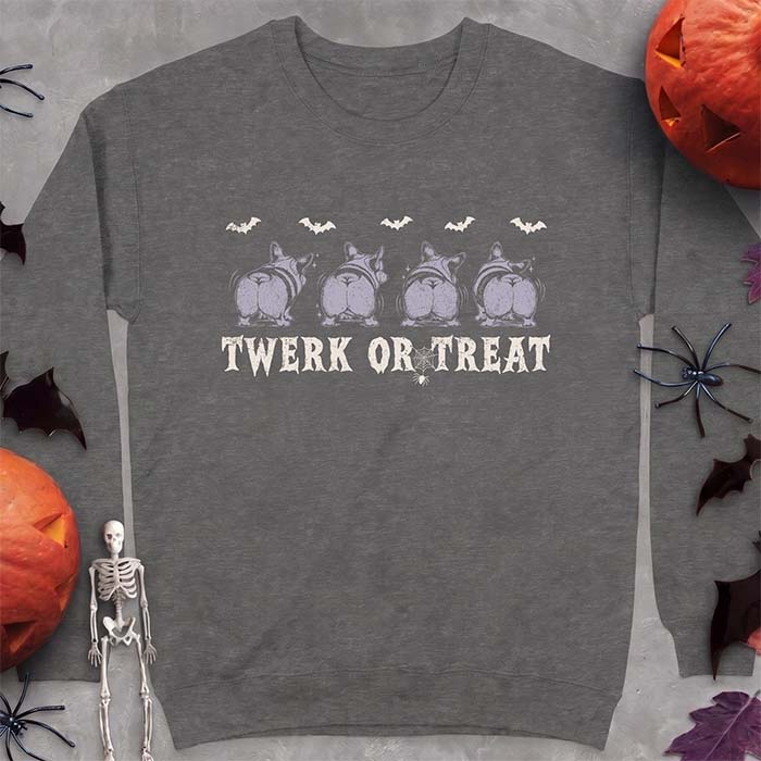 Dark Heather sweatshirt with a Halloween graphic of four Corgis viewed from behind shaking their rumps, bats flying above and a spider on a web, with the text Twerk Or Treat