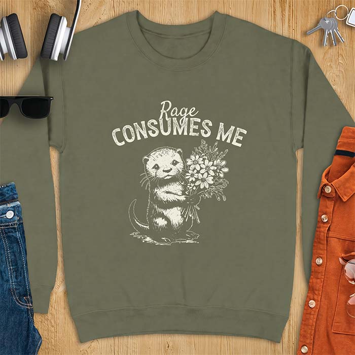Military Green sweatshirt with a graphic of an otter standing upright holding a bouquet of wildflowers and the text Rage Consumes Me