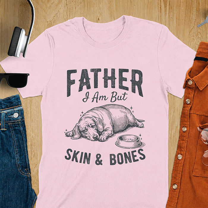 Light pink tee with dachshund graphic and bold distressed "Father I Am But Skin & Bones" text
