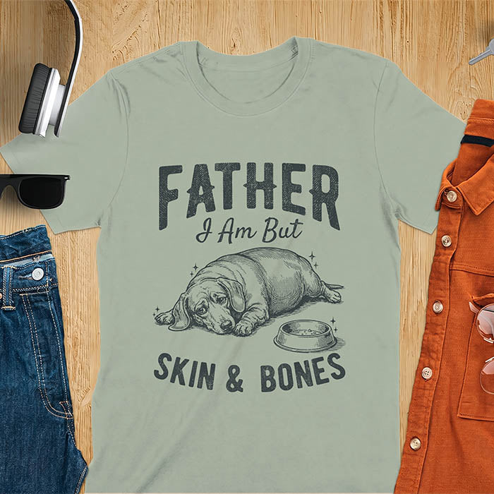 Sage Green tee with dachshund graphic and bold distressed "Father I Am But Skin & Bones" text