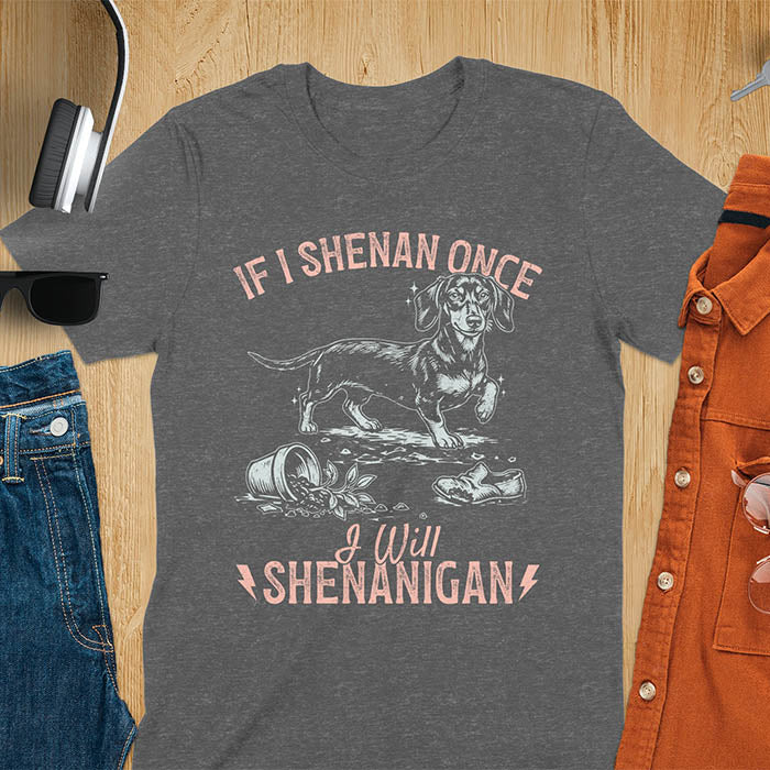 Dark heather t-shirt with If I Shenan Once I Will Shenanigan text and Dachshund illustration surrounded by chaos