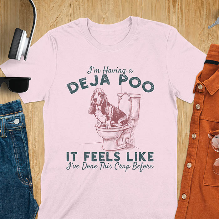 Deja Poo basset hound meme t-shirt with dog on toilet graphic and text I'm Having a Deja Poo It Feels Like I've Done This Crap Before - light pink
