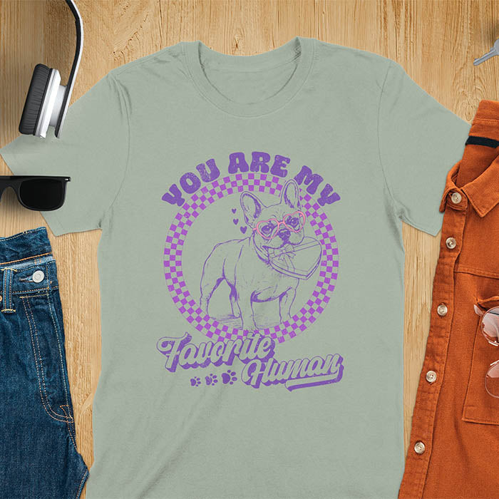 You Are My Favorite Human French Bulldog graphic tee with purple checkered circle design and paw prints on sage green shirt