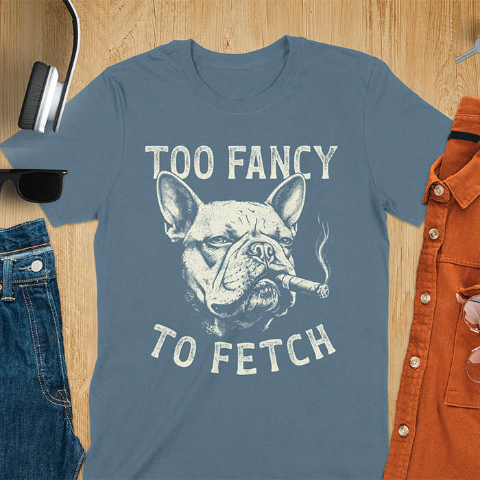 Indigo blue t-shirt with French Bulldog smoking cigar graphic featuring 'Too Fancy To Fetch' text - vintage grunge dog meme design