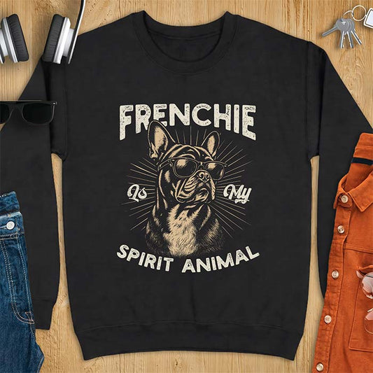 Black sweatshirt featuring a sunglasses-wearing French Bulldog with sunburst rays behind it and the text Frenchie Is My Spirit Animal.