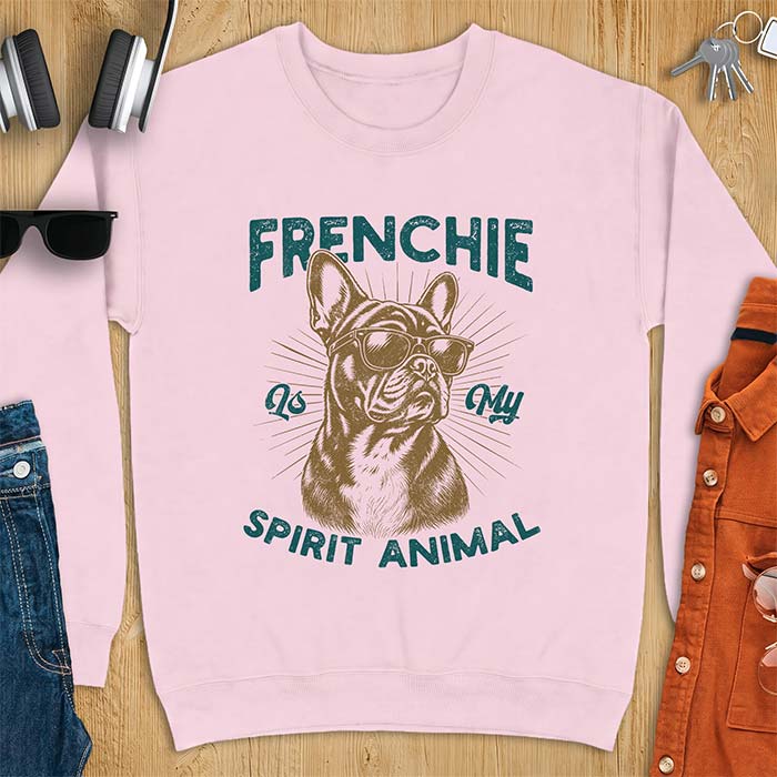 Light Pink sweatshirt featuring a sunglasses-wearing French Bulldog with sunburst rays behind it and the text Frenchie Is My Spirit Animal.