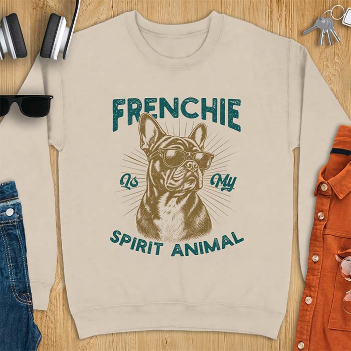 Sand sweatshirt featuring a sunglasses-wearing French Bulldog with sunburst rays behind it and the text Frenchie Is My Spirit Animal.