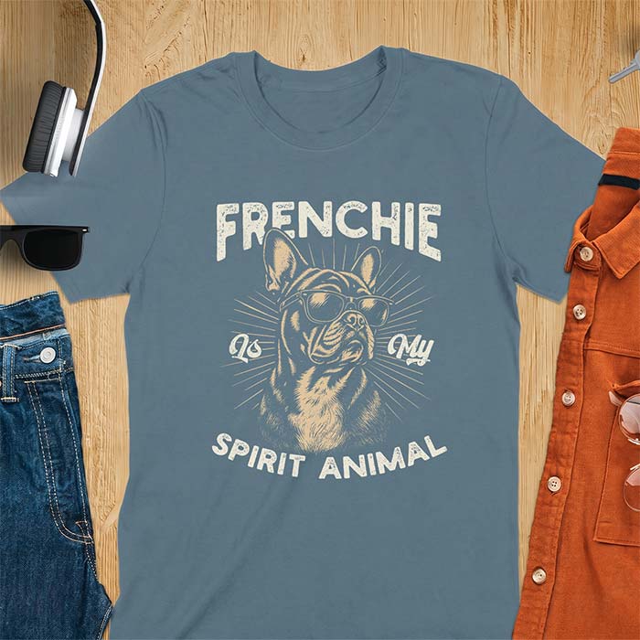 Indigo Blue t-shirt featuring a sunglasses-wearing French Bulldog with sunburst rays behind it and the text Frenchie Is My Spirit Animal.