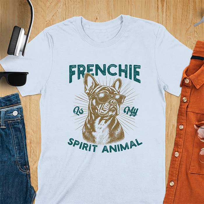 Light Blue t-shirt featuring a sunglasses-wearing French Bulldog with sunburst rays behind it and the text Frenchie Is My Spirit Animal.