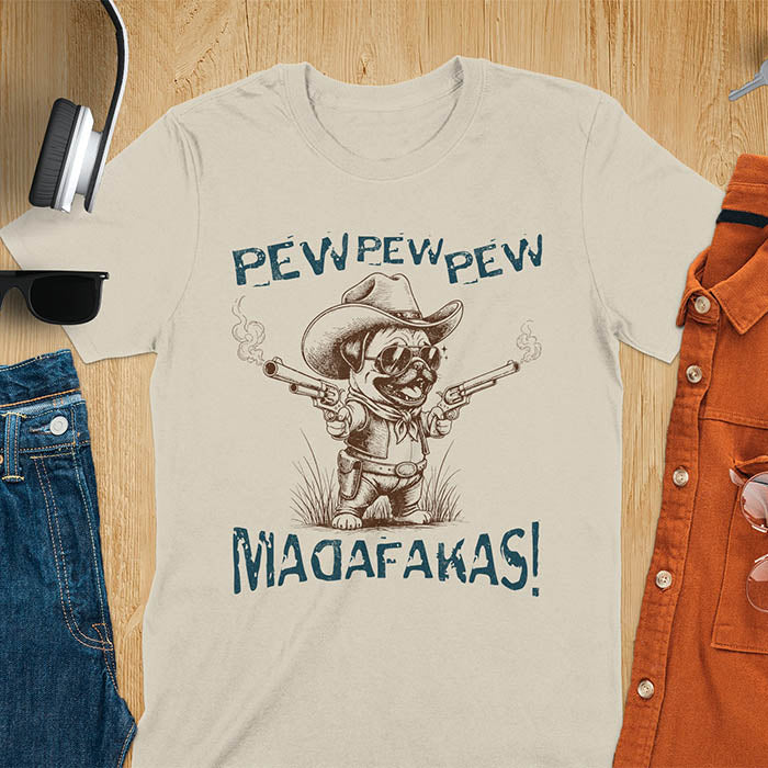 Anthropomorphic pug in vintage illustration style wearing cowboy hat and sunglasses with dual pistols and text saying pew pew pew madafakas on sand color t-shirt