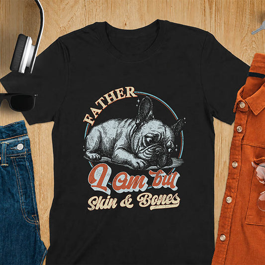 Black t-shirt with funny vintage French Bulldog graphic print reading "Father I Am But Skin & Bones" in retro typography