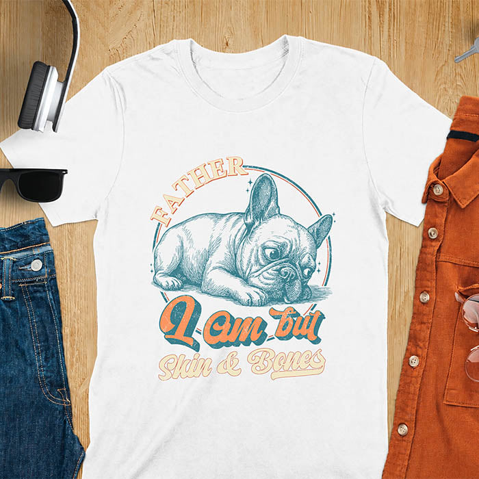 White t-shirt with funny vintage French Bulldog graphic print reading "Father I Am But Skin & Bones" in retro typography