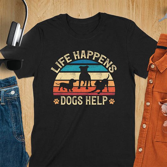 Life Happens Dogs Help vintage retro sunset with dog silhouettes and paw prints on black t-shirt