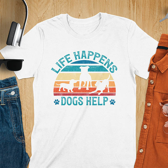 Life Happens Dogs Help vintage retro sunset with dog silhouettes and paw prints on white t-shirt