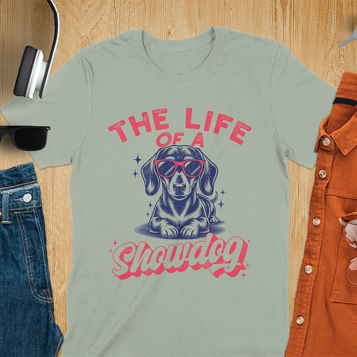The Life of a Showdog vintage dachshund wearing sunglasses retro t-shirt design on sage green tee