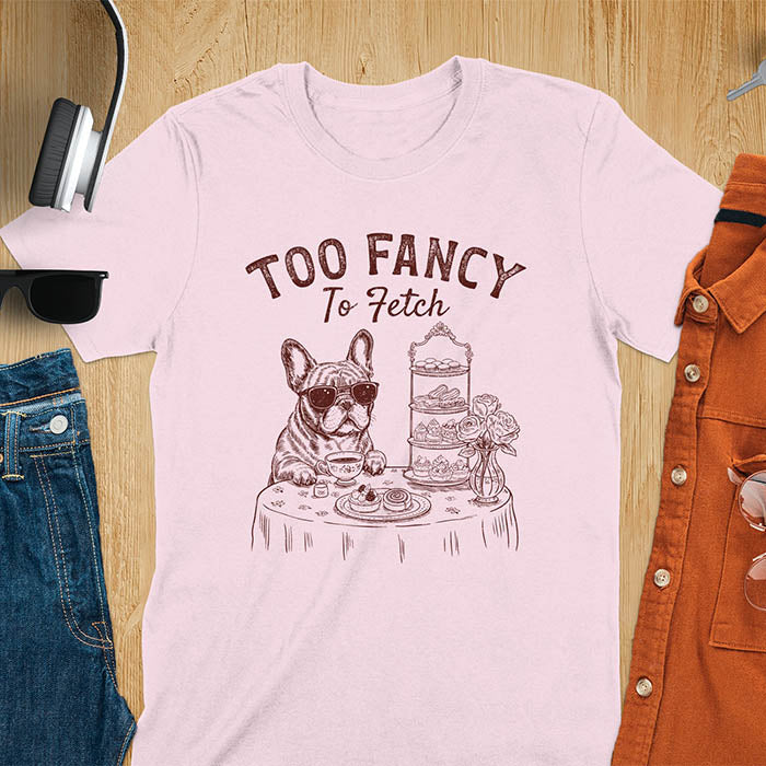 Light pink t-shirt with French Bulldog in sunglasses enjoying afternoon tea with text Too Fancy To Fetch