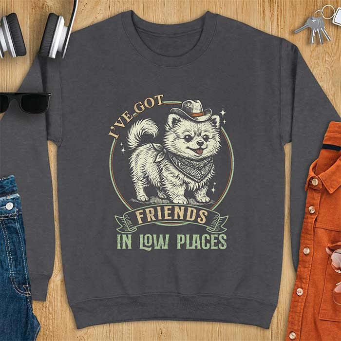 Dark Heather sweatshirt with a vintage western illustration of a fluffy Pomeranian wearing a cowboy hat and a paisley bandana, with the text I've Got arched above it and Friends In Low Places below it
