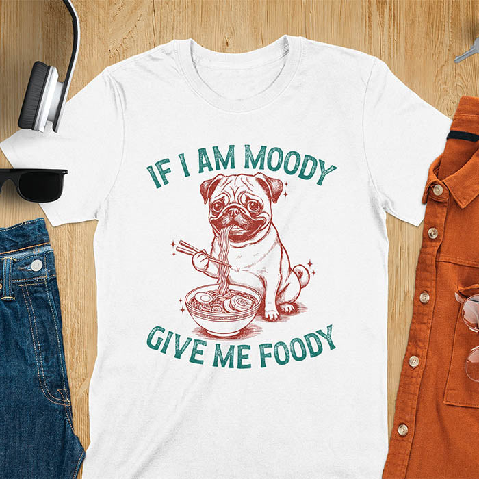 White t-shirt with pug eating ramen with chopsticks graphic featuring 'If I Am Moody Give Me Foody' text - funny dog meme design