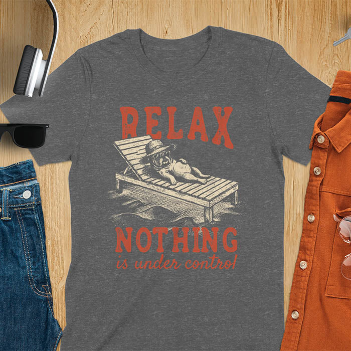 Dark heather t-shirt featuring a bulldog wearing a straw hat lounging on a beach chair with text Relax Nothing Is Under Control in vintage red lettering