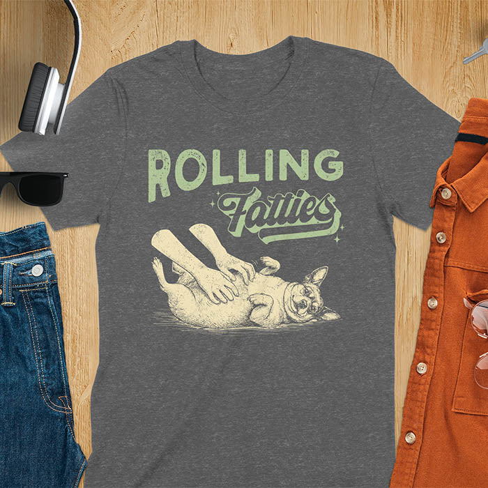 Rolling Fatties vintage text with illustration of chunky terrier lying on back getting belly rubs from human hands