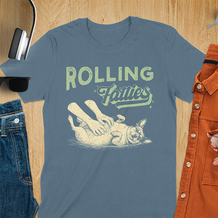 Rolling Fatties vintage text with illustration of chunky terrier lying on back getting belly rubs from human hands