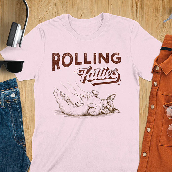 Rolling Fatties vintage text with illustration of chunky terrier lying on back getting belly rubs from human hands