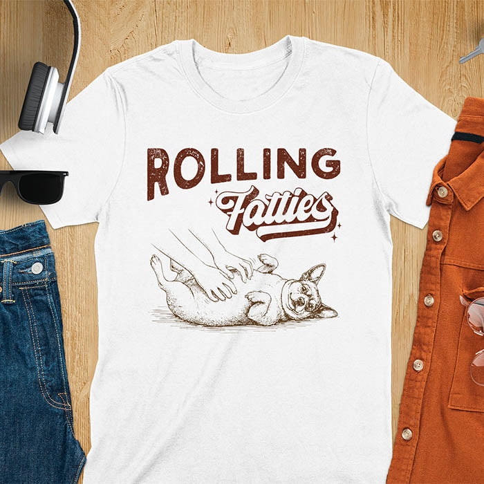 Rolling Fatties vintage text with illustration of chunky terrier lying on back getting belly rubs from human hands