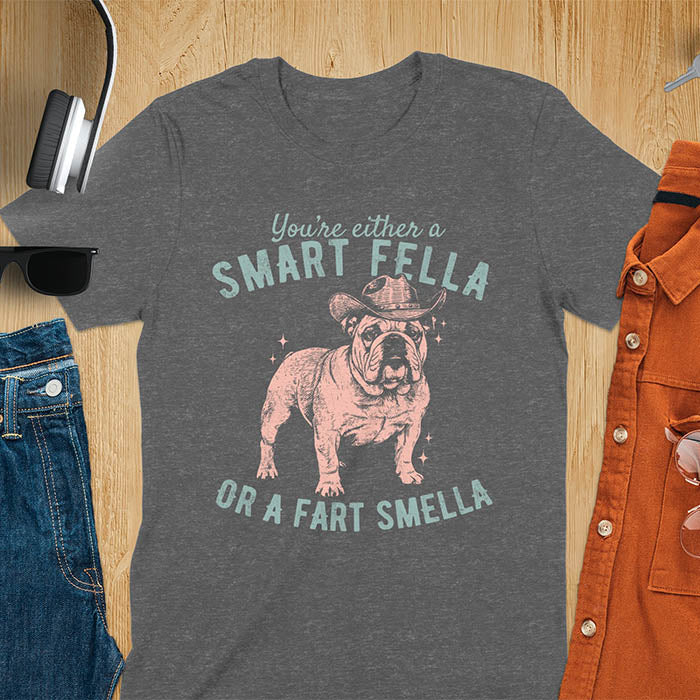 Smart Fella or Fart Smella vintage 90s meme t-shirt with English bulldog wearing cowboy hat on dark heather tee