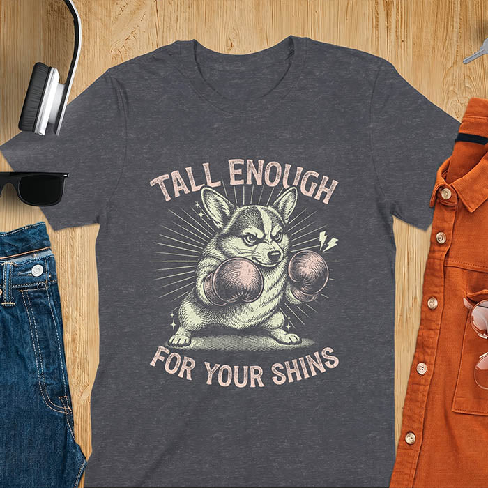 Dark heather graphic tee with retro illustration of a corgi wearing boxing gloves, text reads Tall Enough For Your Shins