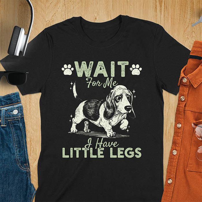 Basset hound meme t-shirt with dog illustration and text Wait For Me I Have Little Legs with paw prints - black