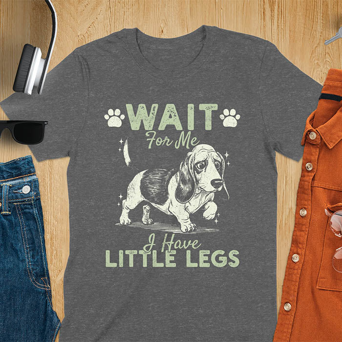 Basset hound meme t-shirt with dog illustration and text Wait For Me I Have Little Legs with paw prints - dark heather