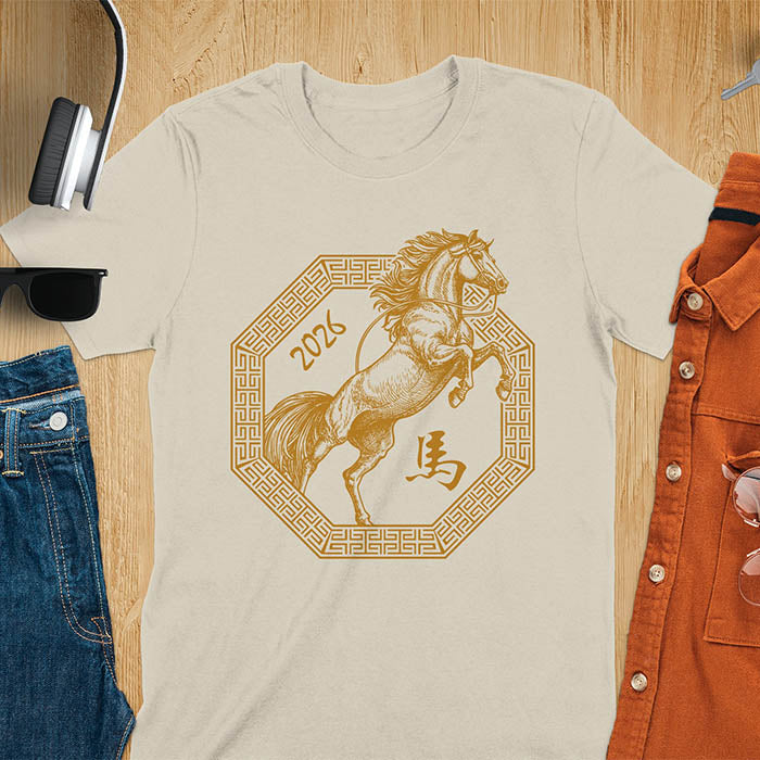 Year of the Horse t-shirt with golden rearing horse in Ba Gua octagon, Chinese character for horse, and 2026 - sand color