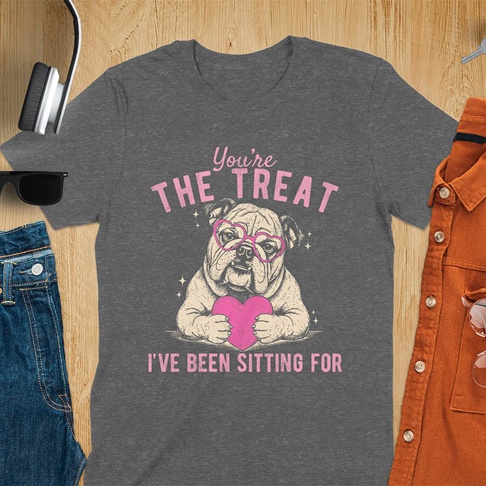You're the treat I've been sitting for bulldog with pink heart glasses holding pink heart graphic tee on dark heather shirt