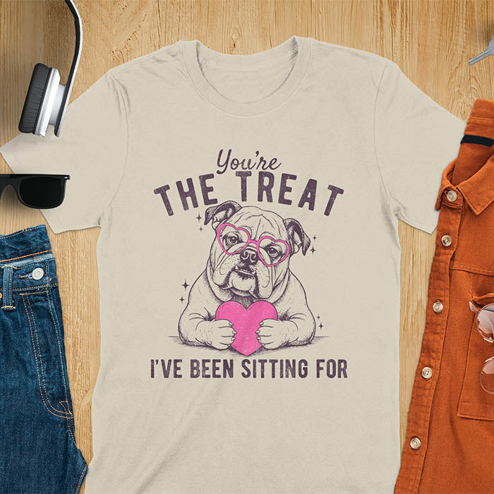 You're the treat I've been sitting for bulldog with pink heart glasses holding pink heart graphic tee on sand color shirt